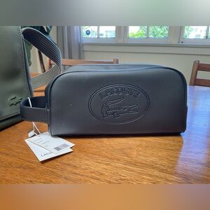 Lacoste toilet kit black great for travel can use as wristlet